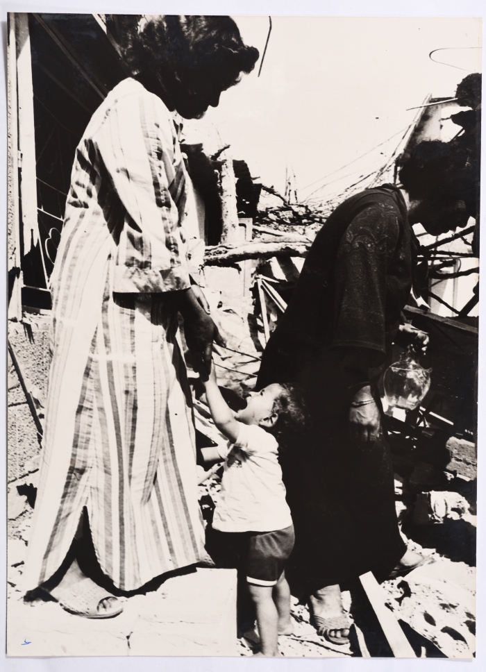 A Child with his Mother in a Refugee Camp in Southern Lebanon