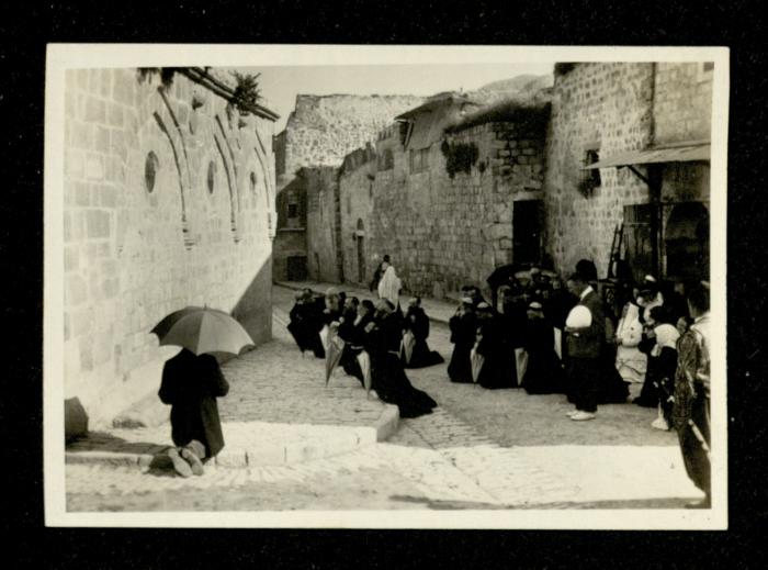 Christian Pilgrims Seated in the Via Dolorosa Area, Jerusalem, the 1920s