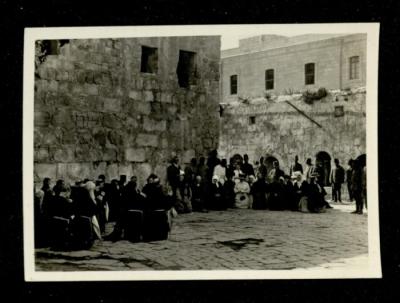 Christian Pilgrims sitting in the Via Dolorosa area, Jerusalem, the 1920s