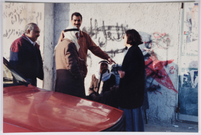 A photo of Salah Ayyad with people from his village
