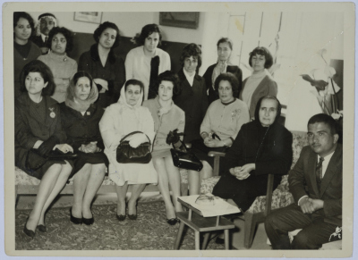 A group of women with Prince Hassan bin Talal