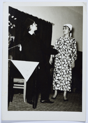Two students from Dar al-Yatemat during a theatrical performance at Homecoming