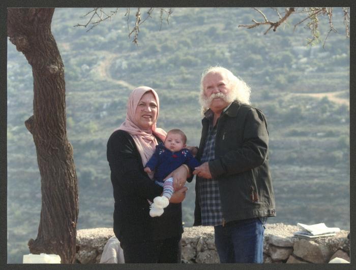 Adel Tartir and His Wife Tahani Holding Their Granddaughter Tia, 2018