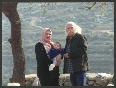 Adel Tartir and His Wife Tahani Holding Their Granddaughter Tia, 2018