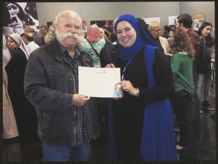 Adel Tartir and a Participant in the 