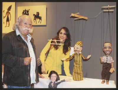 Adel Tartir with his Daughter Hanin at an Exhibition of Dolls and Puppets in Egypt, 2015