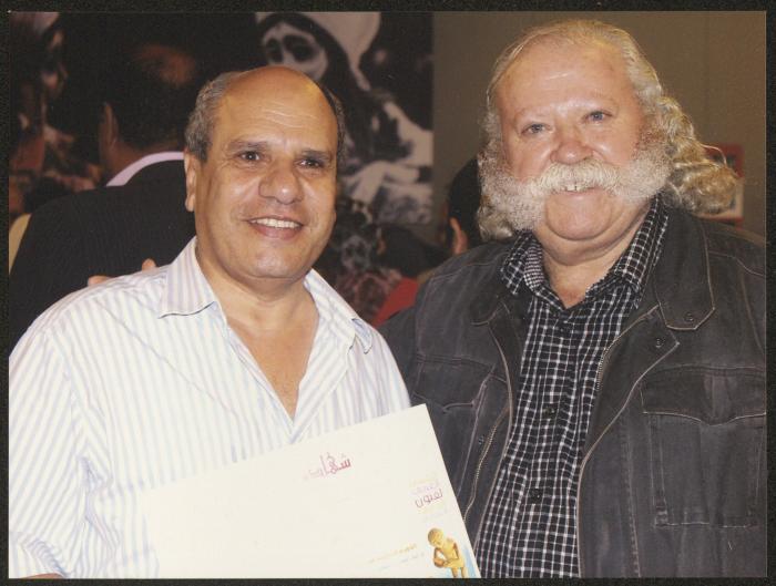 Adel Tartir and a Participant in the 