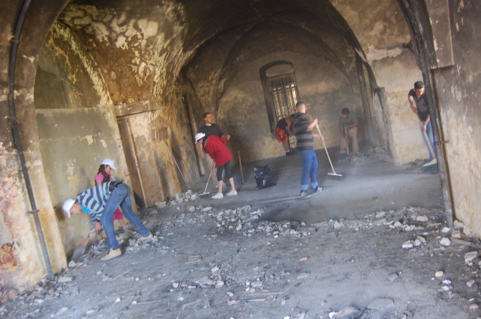 Cleaning the Palestinian Circus School's Building Before its Renovation in the Town of Birzeit 