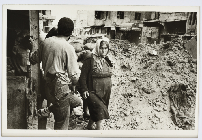 Crossing Earth Mounds in a Palestinian Refugee Camp, Lebanon, 1985- 1986