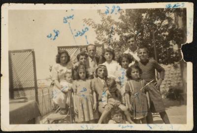 Bakr Abdel-Haq and His Children in Their House Garden, Nablus, 1950