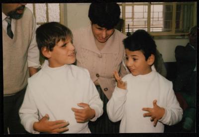 Two Special Needs Children with Their Caretaker, the 1980s 