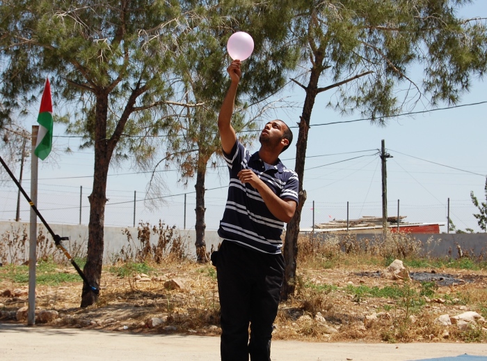 صورة من يومٍ مفتوح لمدرسة سيرك فلسطين في جنين، 2012
