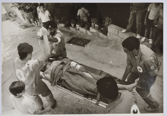 Evacuating a Wounded Person from a Palestinian Refugee Camp, Lebanon, 1985- 1987