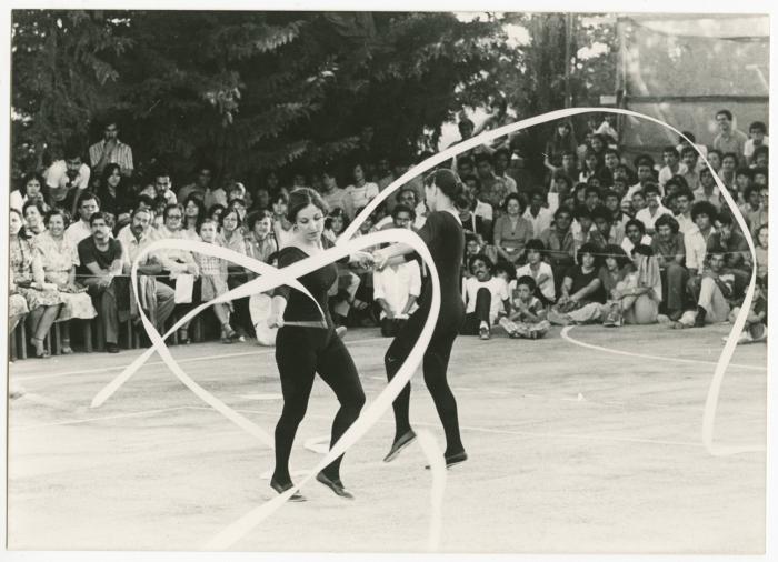 Presentation of Two Students from Birzeit College with Ribbons, the 1970s