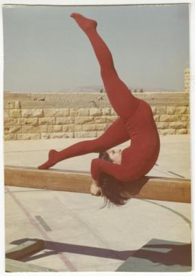 Norma Zaghloul Performing Gymnastics on a Beam, Birzeit College, 1974