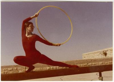 Wafa bushnaq Performing Gymnastics on a Beam, Birzeit College, 1974