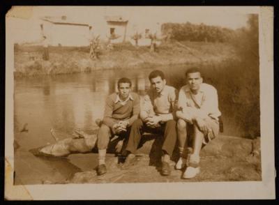 Emil Costandi with His Teacher and Classmate at the Orchard of Taher Salah, Yafa, 1947