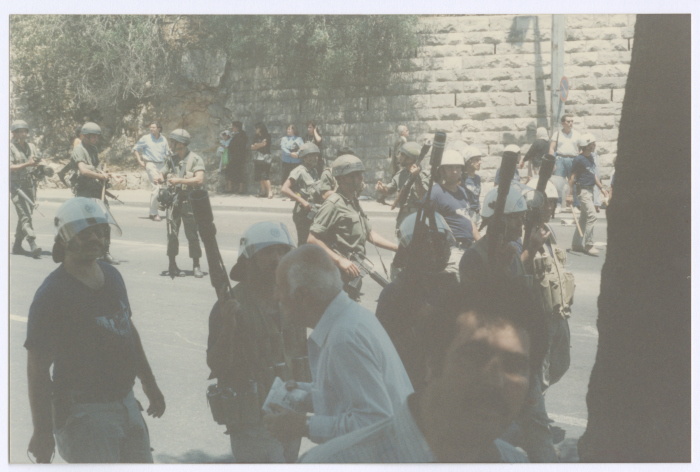 The Israeli Occupation Soldiers Suppressing the Participants of Shaheed Omar al-Qasim's Funeral, Jerusalem, 1989