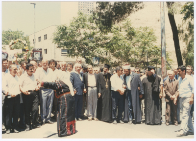 An Elderly Palestinian Woman Chanting at Shaheed Omar al-Qasim