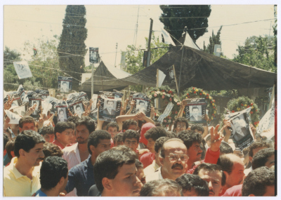 Men Raising Posters of Shaheed Omar al-Qasim, Jerusalem, 1989