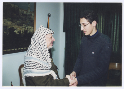Young Karmel abu Hasna Shaking Yasser Arafat