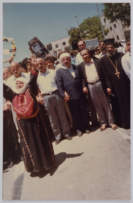 An Elderly Woman Chanting at Shaheed Omar al-Qasim