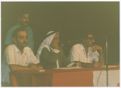 Men at Shaheed Omar al-Qasim