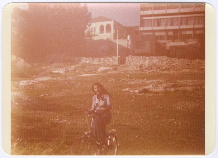 Amal al-Qasim Riding a Bicycle, Jerusalem, the 1970s 