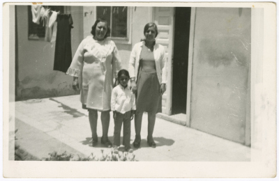 Amna and Fatima al-Shalabi in front of the Family House, Amman, the 1960s