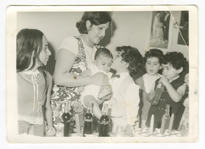 A mother and her children at a birthday party