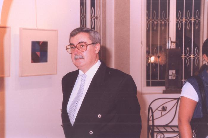 A photograph from the opening of the artist Kamal Boullata's exhibition, Damascus, 1994