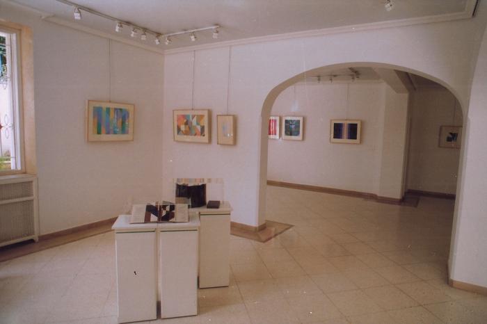 A photograph from the opening of the artist Kamal Boullata's exhibition, Damascus, 1994