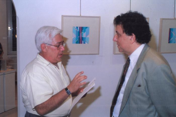 A photograph from the opening of the artist Kamal Boullata's exhibition, Damascus, 1994