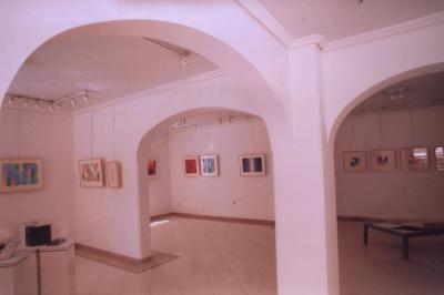 A photograph from the opening of the artist Kamal Boullata