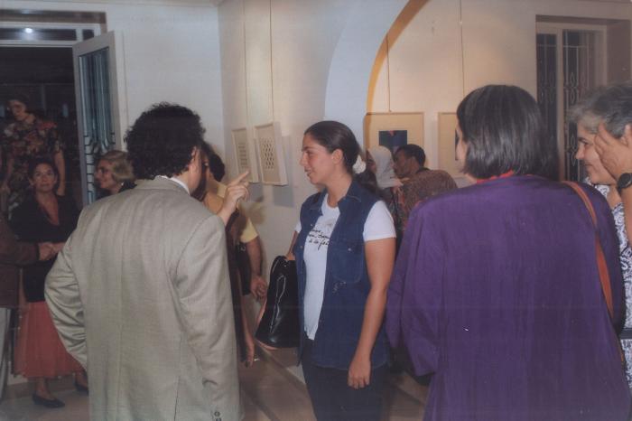 A photograph from the opening of the artist Kamal Boullata's exhibition, Damascus, 1994