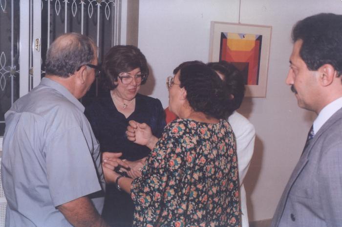 A photograph from the opening of the artist Kamal Boullata's exhibition, Damascus, 1994