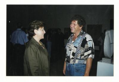 A photograph of artist Jabr Alwan, Mona Atassi from the opening of Arab Professionals exhibition, Beirut, 2001