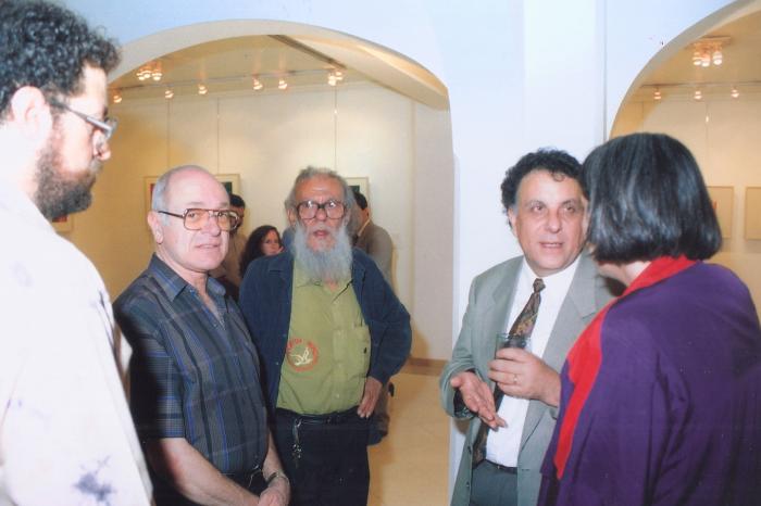 A photograph from the opening of the artist Kamal Boullata's exhibition, Damascus, 1994