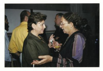 A photograph of artist Mona Al-Saudi, Mona Atassi from the opening of Arab Professionals exhibition, Beirut, 2001