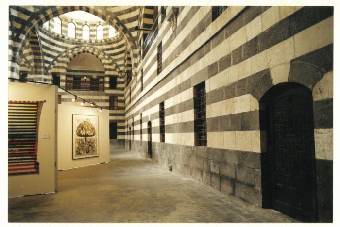 A photograph from the opening of an Arab professional exhibition, Damascus, 2001