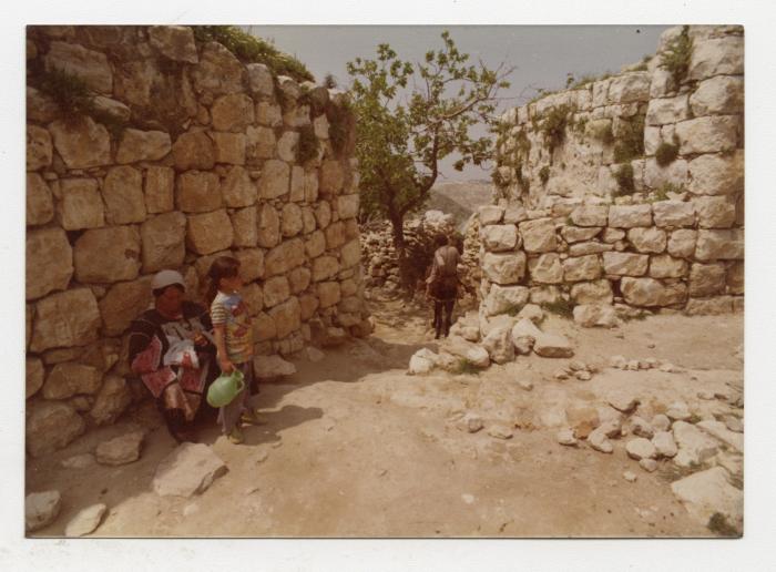 A Palestinian woman and her daughter, Deir Ibzi village, 1980s 
