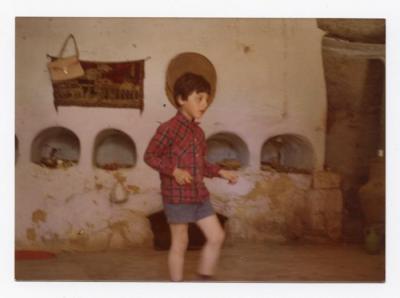 A child walking in the middle of their house, Turmus Ayya Village, 1980s