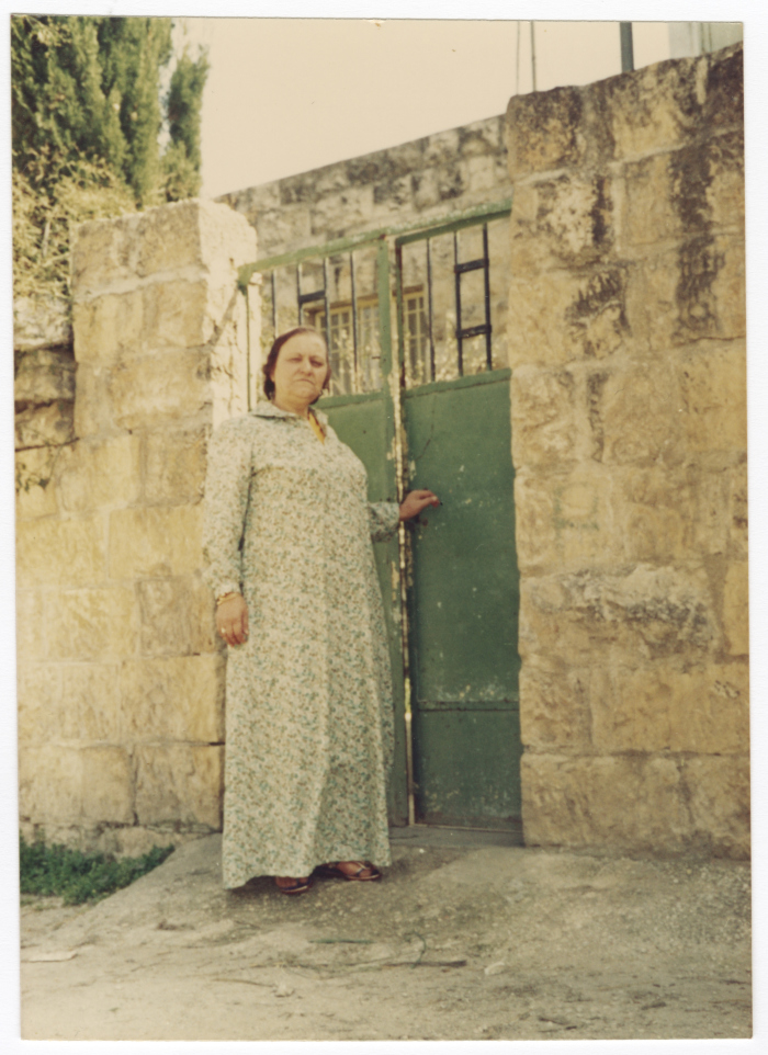 Fatima al-Shalabi in front of the Family House in Sheikh Jarrah, Jerusalem, 1967