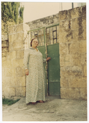 Fatima al-Shalabi in front of the Family House in Sheikh Jarrah, Jerusalem, 1967