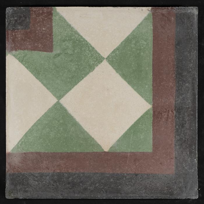 A Coloured Cement Tile and the Mold Used to Manufacture It , 