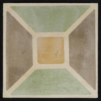 A Coloured Cement Tile and the Mold Used to Manufacture It