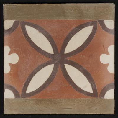 A Coloured Cement Tile and the Mold Used to Manufacture It