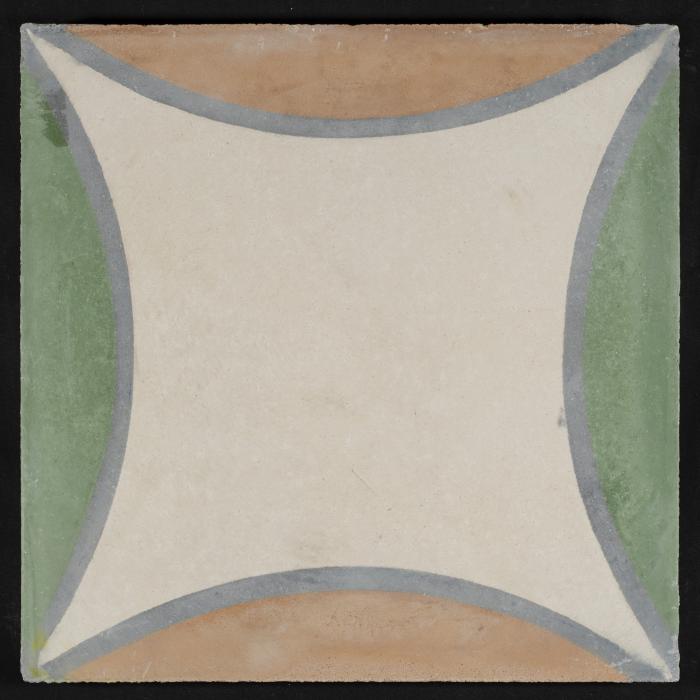 A Coloured Cement Tile and the Mold Used to Manufacture It