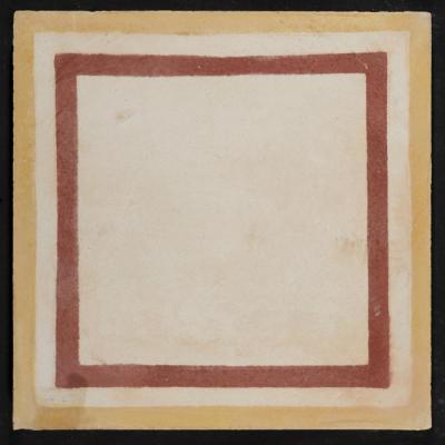 A Coloured Cement Tile and the Mold Used to Manufacture It