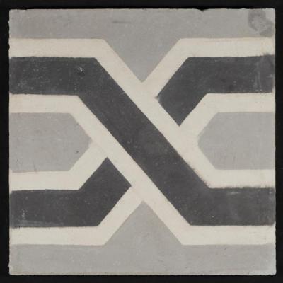 بلاطة إسمنتية ملونة والقالب المستخدم لصناعتها 